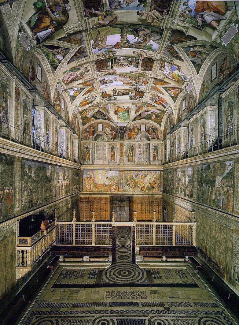 The painted ceiling and walls of the Sistine Chapel
